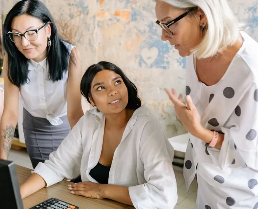 Three colleagues reviewing payments